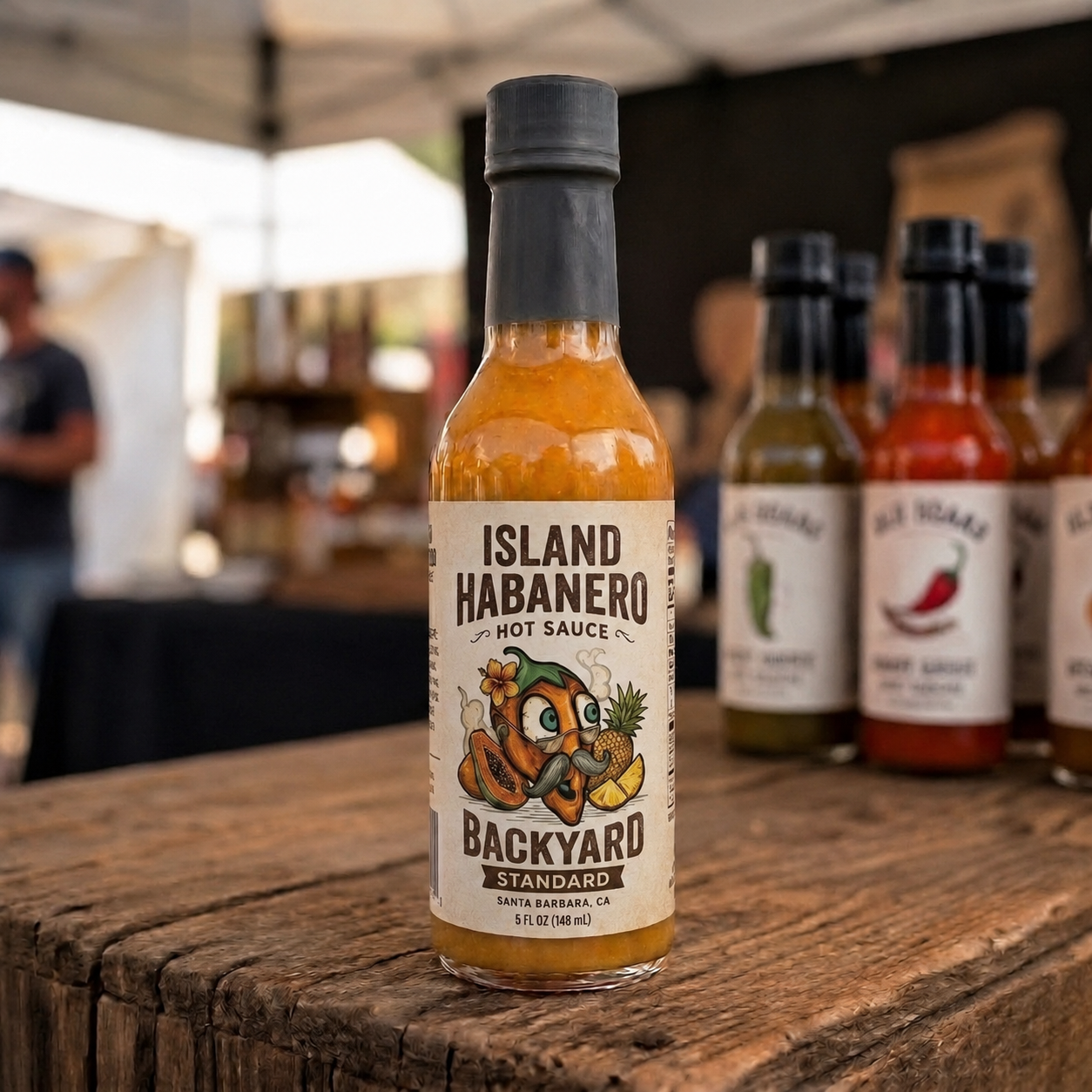 Island Habanero 5 fl oz hot sauce bottle on a wooden table, with its label visible.